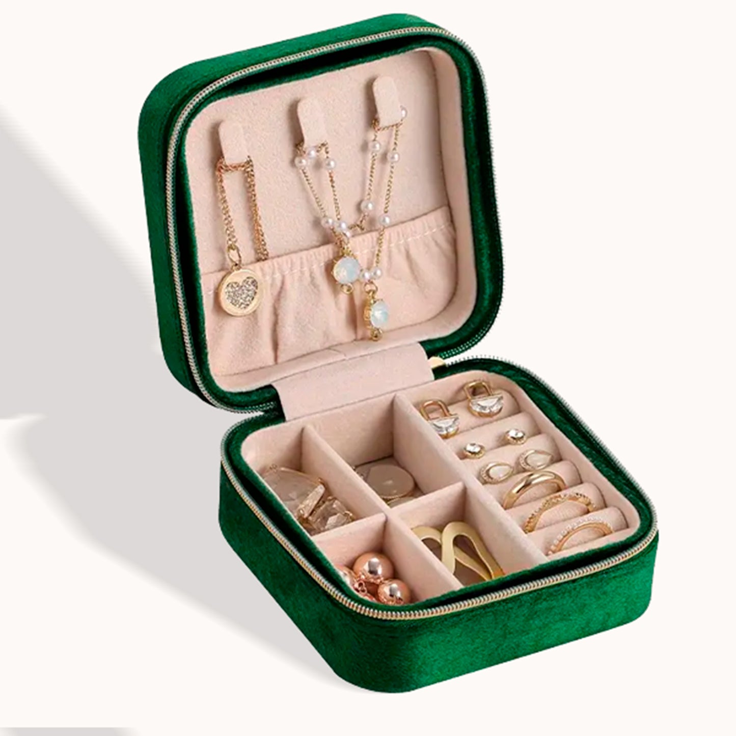 Organizador de joyería para viaje de terciopelo. Cuadrado, color verde obscuro.