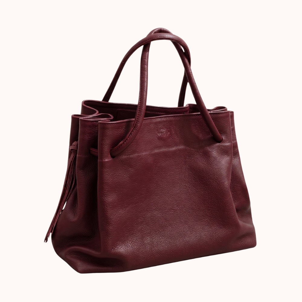 bolsa valencia dorotea tote bag de piel granulada color vino borgoña con fuelles ajustables artesanal leon guanajuato
