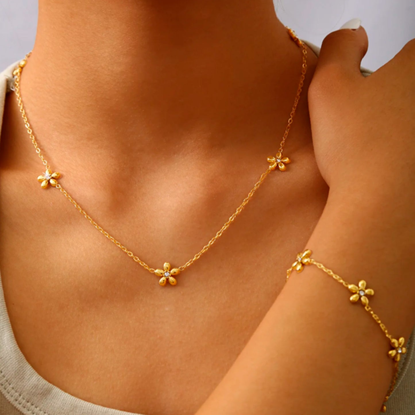Collar y pulsera margaritas de acero inoxidable